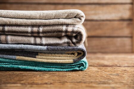 Autumn flat lay with clothes on wooden table