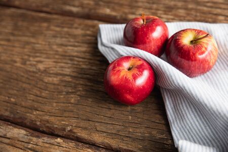 Autumn apple harvest flat lay on wooden tableの写真素材