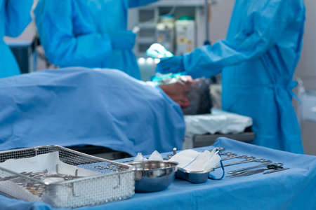 Caucasian female patient lying on surgical bed with oxygen mask. medicine, health and healthcare services during coronavirus covid 19 pandemic.の写真素材