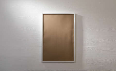 Composition of brown card in frame with copy space on white background. interior design and decor...