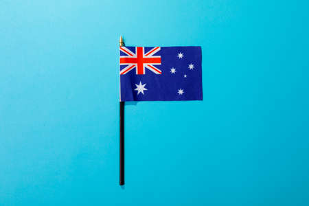Overhead view of australia flag isolated on blue background with copy space. independence day,...