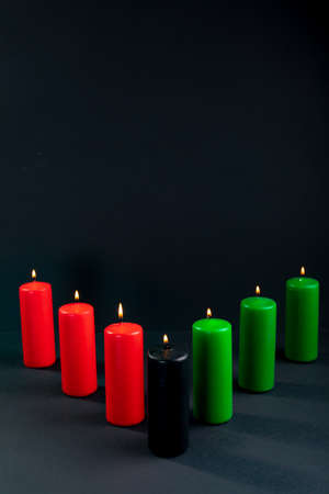 Composition of halloween candles and copy space on black background. horror, fright, halloween tradition and celebration concept digitally generated image.の写真素材