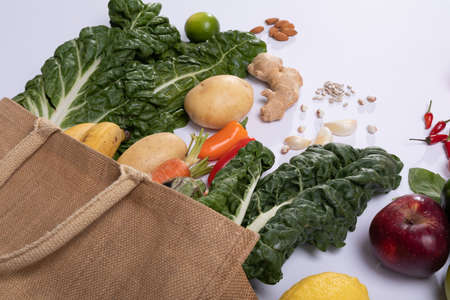 High angle view of fruits and vegetables with various ingredient on white background, copy space. unaltered, food and healthy eating concept.の写真素材