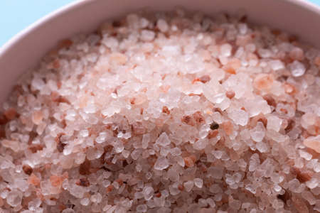 Close-up of himalayan salt in bowl. unaltered, copy space, backgrounds, ingredient, food, rock salt and seasoning.の写真素材
