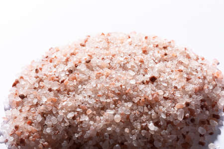 Close-up of pink himalayan rock salt against white background. unaltered, ingredient, food, rock...