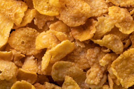Full frame shot of crunchy cornflakes with copy space. unaltered, breakfast, healthy food, snack and food concept.の写真素材