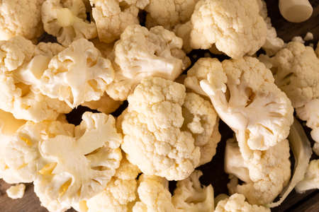 Close-up full frame shot of fresh cauliflower on table. unaltered, vegetable, healthy food, raw food and organic concept.の写真素材