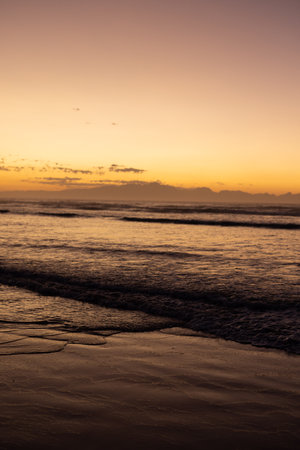 Scenic view of seascape with reflection of sunlight against sky during sunset, copy space. unaltered, beach and nature concept.の写真素材