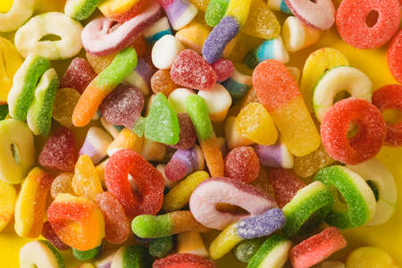 Overhead full frame view of multi colored sugar candies pile. unaltered, unhealthy eating and sweet...