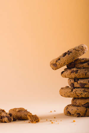 Close-up of stack of cookies on brown background with copy space. unaltered, food, baked, studio...