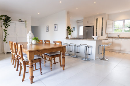 The interior of a beautiful large modern kitchen with a dining area. Interiors and interior design.