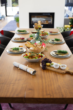Close up of table with dinner and decorations at christmas. Christmas, celebration, tradition, party...