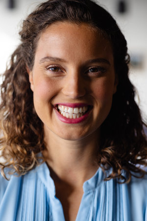 Portrait of happy caucasian casual businesswoman in office. Casual office, business, professional...