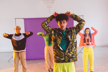 Image of group of group of diverse female and male hip hop dancers taking part in photo shot. Dance,...