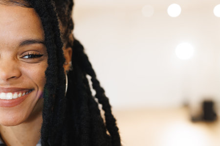 Image of happy african american female hip hop dancer posing to camera with copy space. Dance,...