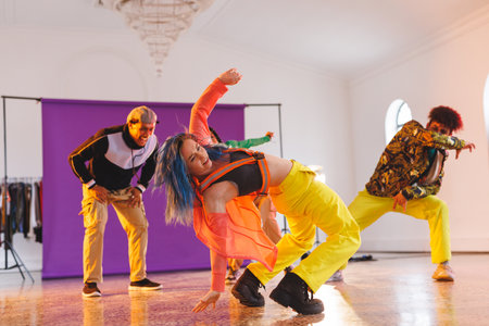 Image of group of group of diverse female and male hip hop dancers taking part in photo shot. Dance,...