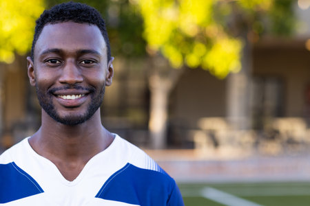 African American young male athlete and fitness model, wearing sporty clothes, copy space. He has...
