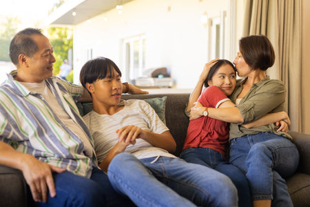 Relaxing on couch, happy family bonding and spending quality time together. relaxation, happiness,...