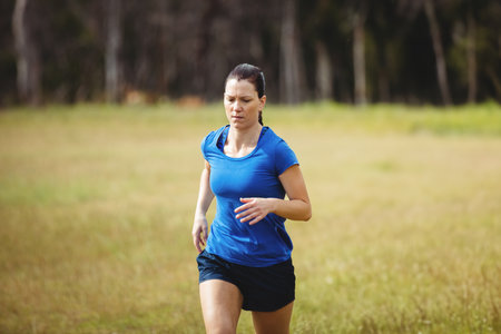 Fit people running in boot campの写真素材