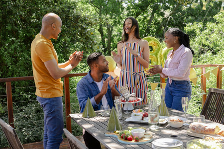 Camera starting from static sunlit room is panning right downward to reveal cozy holiday interiorの写真素材