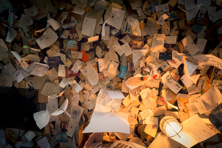 Scattered papers - Many papers, newspaper clippings, letters and more scattered on the ceilingの写真素材