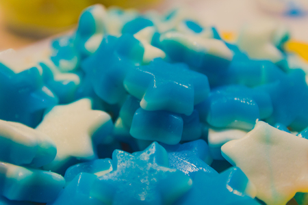 Close up of bowl with colorful sweet tasty gummy candy at children birthday party.の写真素材