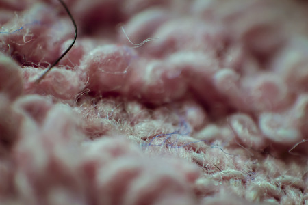 Macro closeup of soft pink fabric background.の写真素材