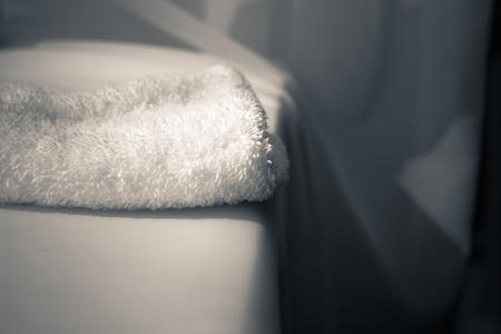 White towel on white cloth background.の写真素材