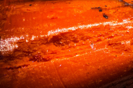 Orange pencil tip under the microscope. Closeup macro photography.の写真素材