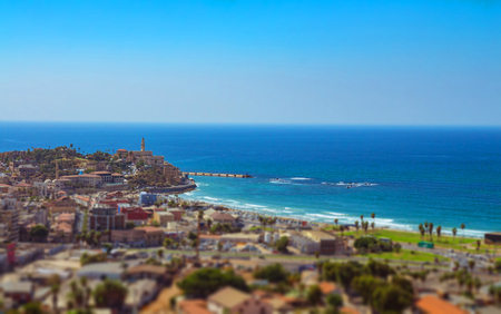 Aerial view of south Tel Aviv neighborhoods and Old Jaffa. Recognized places such as the Etzel Museum, Old Jaffa Port, Tel Aviv promenade and Neve Tzedek neighborhood. Tilt shift.の写真素材
