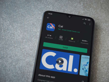 Lod, Israel - July 8, 2020: Cal app play store page on the display of a black mobile smartphone on ceramic stone background. Top view flat lay with copy space.のeditorial素材