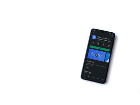 Lod, Israel - July 8, 2020: Robin app play store page on the display of a black mobile smartphone isolated on white background. Top view flat lay with copy space.のeditorial素材