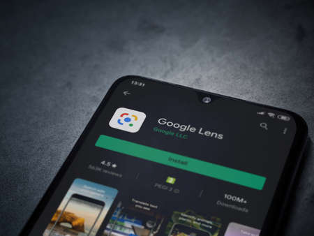 Lod, Israel - July 8, 2020: Google Lens app play store page on the display of a black mobile...