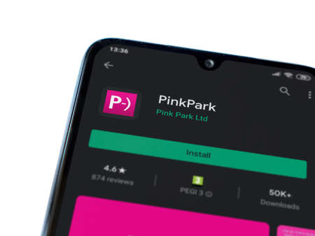 Lod, Israel - July 8, 2020: Pink Park app play store page on the display of a black mobile smartphone isolated on white background. Top view flat lay with copy space.のeditorial素材