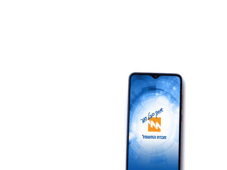 Lod, Israel - July 8, 2020: Israel Electric Corporation app launch screen with logo in hebrew text...