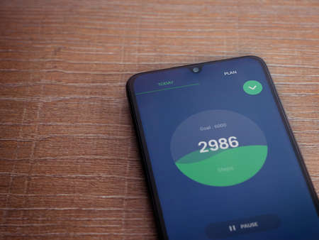 Lod, Israel - July 8, 2020: Leap Fitness Step Counterapp launch screen with logo on the display of a...