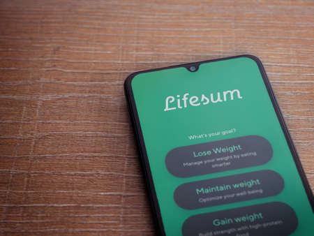 Lod, Israel - July 8, 2020: Lifesum app launch screen with logo on the display of a black mobile...