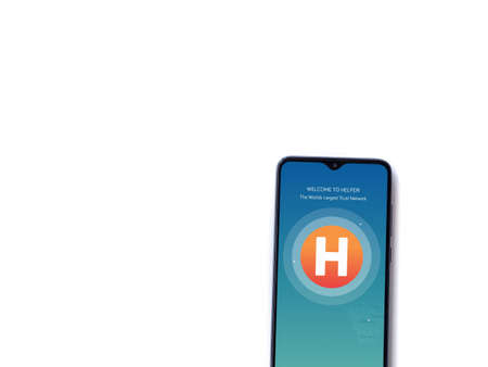 Lod, Israel - July 8, 2020: Helpers app launch screen with logo on the display of a black mobile...