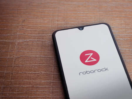 Lod, Israel - July 8, 2020: Roborock app launch screen with logo on the display of a black mobile...