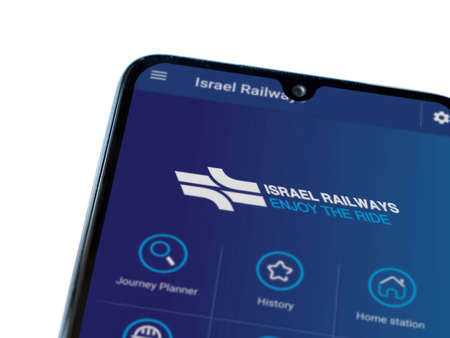 Lod, Israel - July 8, 2020: Israel Railways app launch screen with logo on the display of a black...