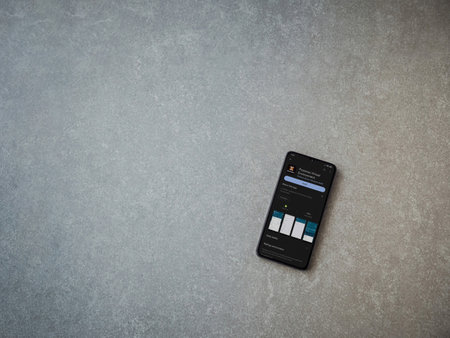 Lod, Israel - July 16,2023: Proxmox Virtual Environment app play store page on smartphone on ceramic stone background. Top view flat lay with copy space.のeditorial素材