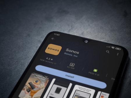 Lod, Israel - July 16,2023: Sonos app play store page on smartphone on a dark marble stone background. Top view flat lay with copy space.のeditorial素材