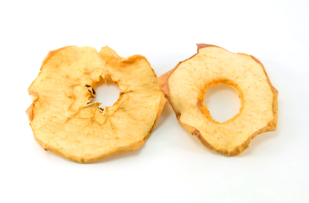 Dry of two sliced red apple on white backgroundの写真素材