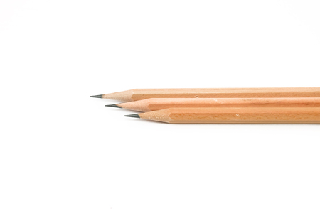 Sharpened wooden brown Pencils; white backgroundの写真素材