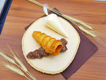 Cream cornet crispy pie cone with homemade vanilla cream whipの写真素材
