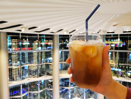 Oolong lychee iced tea with colorful bokeh backgroundの写真素材