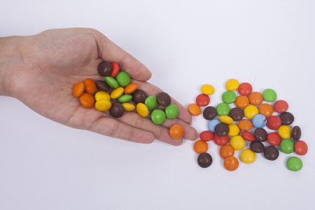 portrait of spread candy chocolate, isolate white backgroundの写真素材