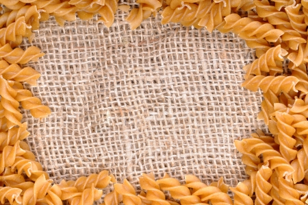 Wholemeal fusilli italian pasta  Background の写真素材