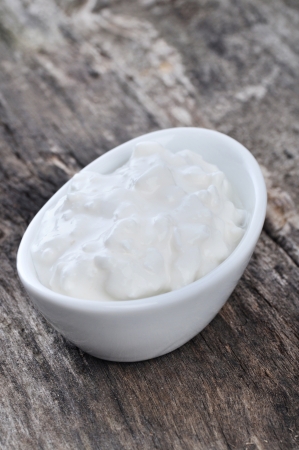 Cottage cheese on  a wooden tableの写真素材