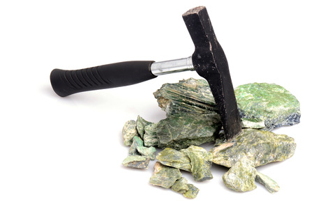 Hammer and serpentynite isolated on white backgroundの写真素材
